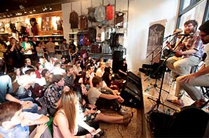 The Manchester Orchestra band performing front of a crowd
