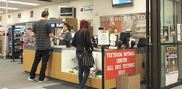 Students paying for their merchandise at Santa Ana College Don's bookstore registers.